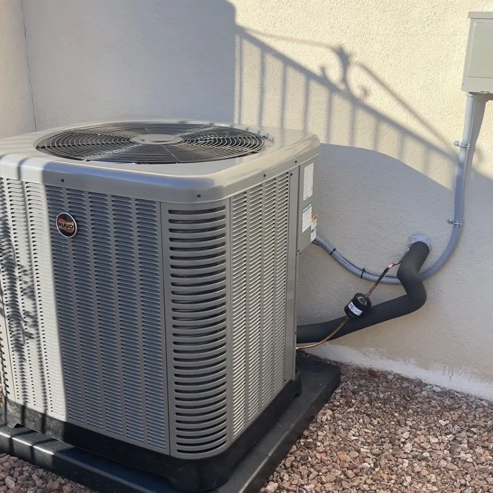 Freeze Zone technician working on air conditioning equipment